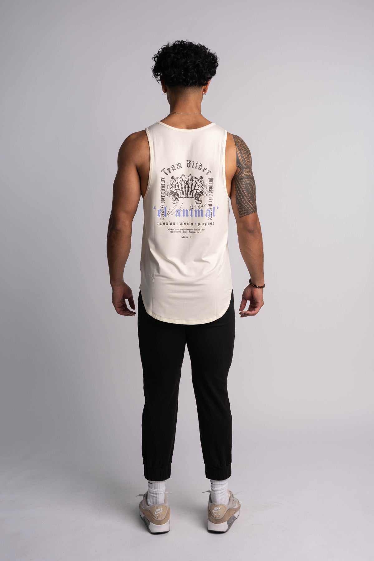 'El Animal' Premium Drop-Cut Tank Top in Off White